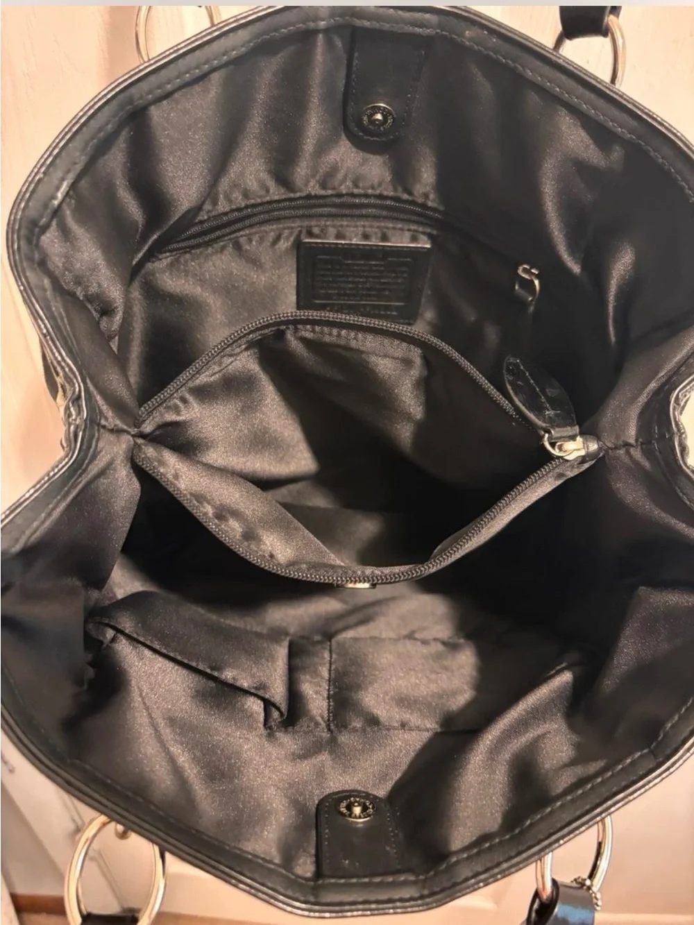 Coach Black and Beige Signature Tote with Front Turn-Lock Pocket